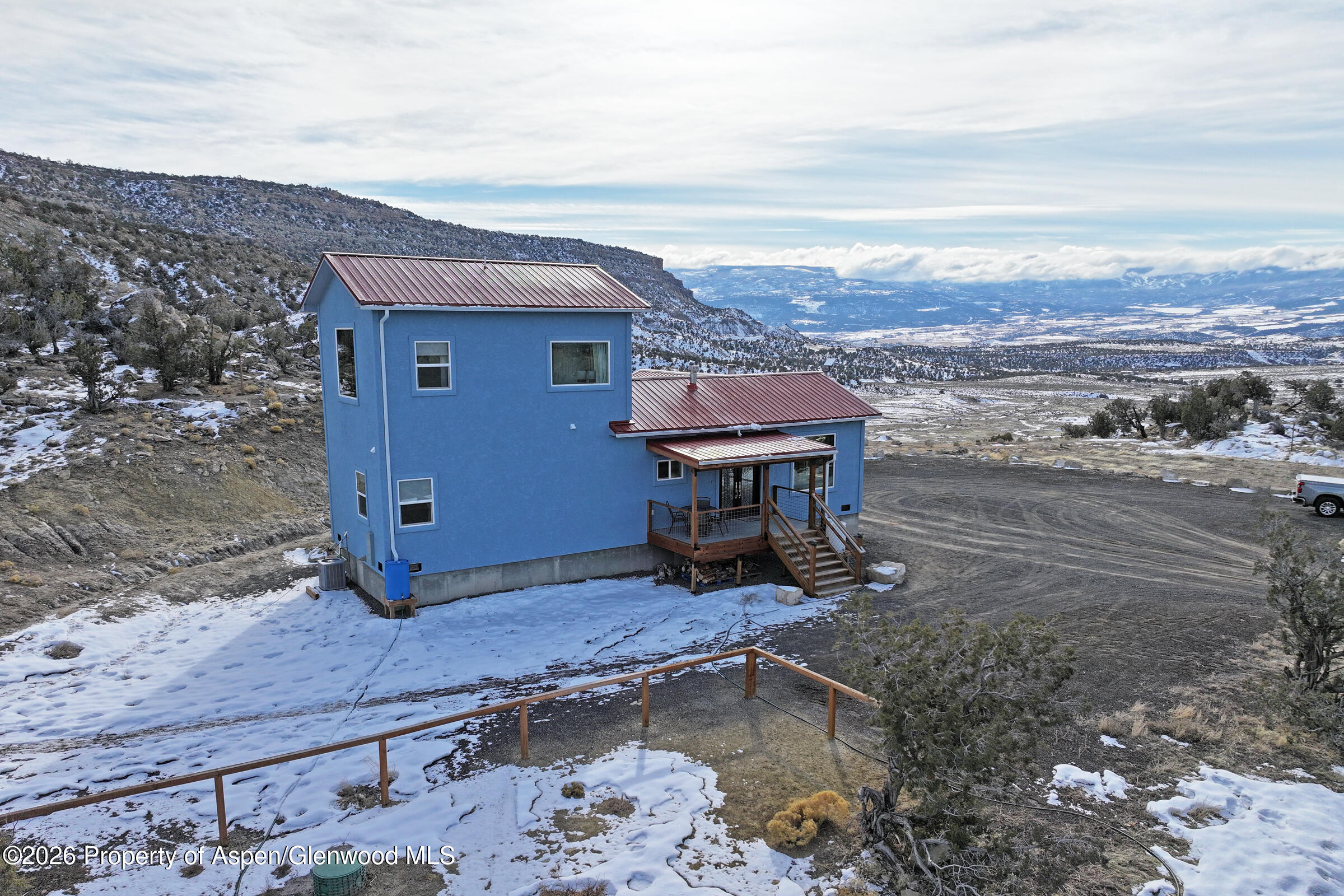 15086 45 45 1/2 Road De Beque, CO 81630 - Photo 39 of 40 a view of a terrace with a bench