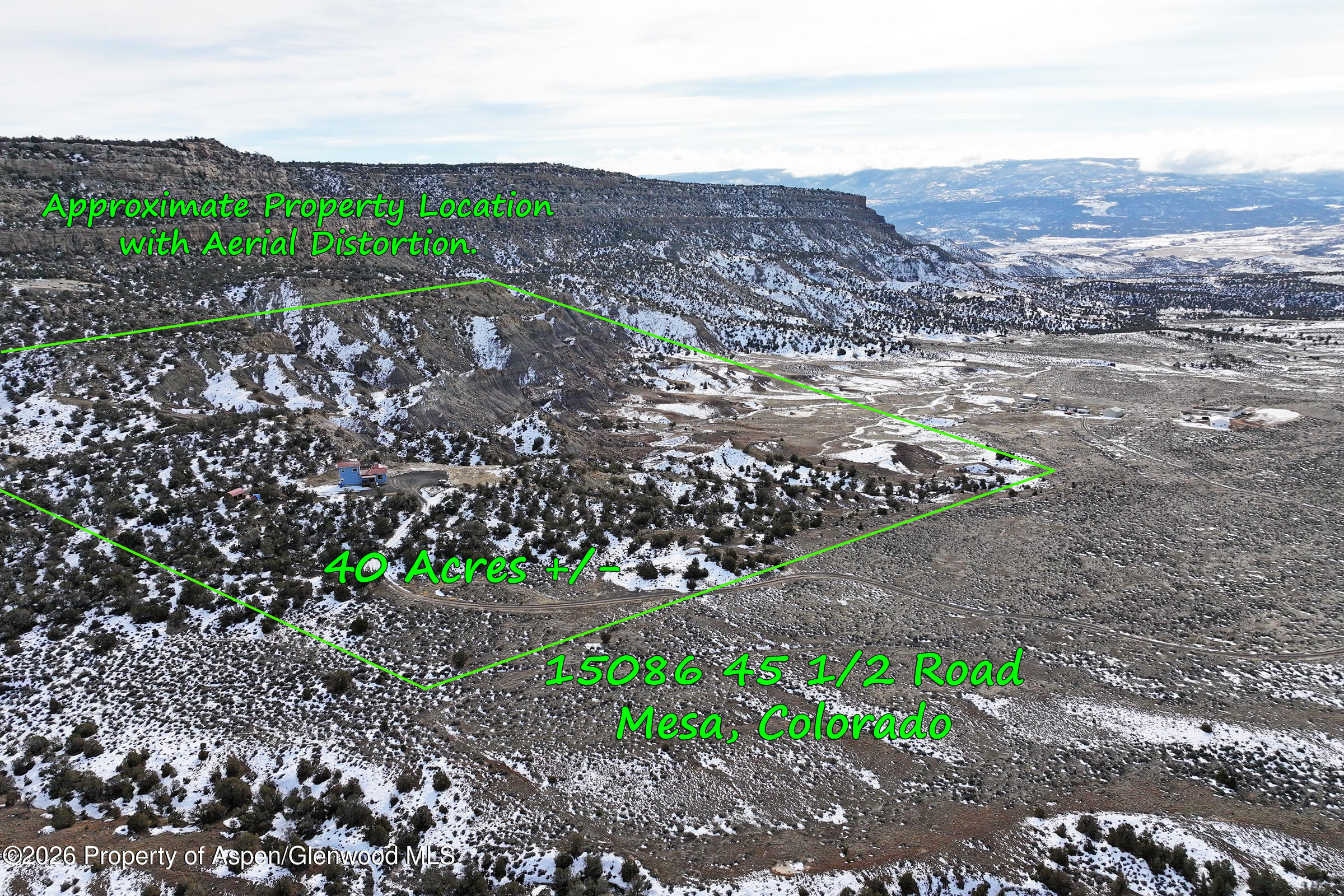 15086 45 45 1/2 Road De Beque, CO 81630 - Photo 4 of 40 a view of a large mountain with mountains in the background
