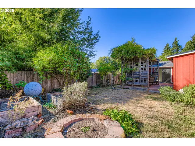 a backyard of a house with lots of green space
