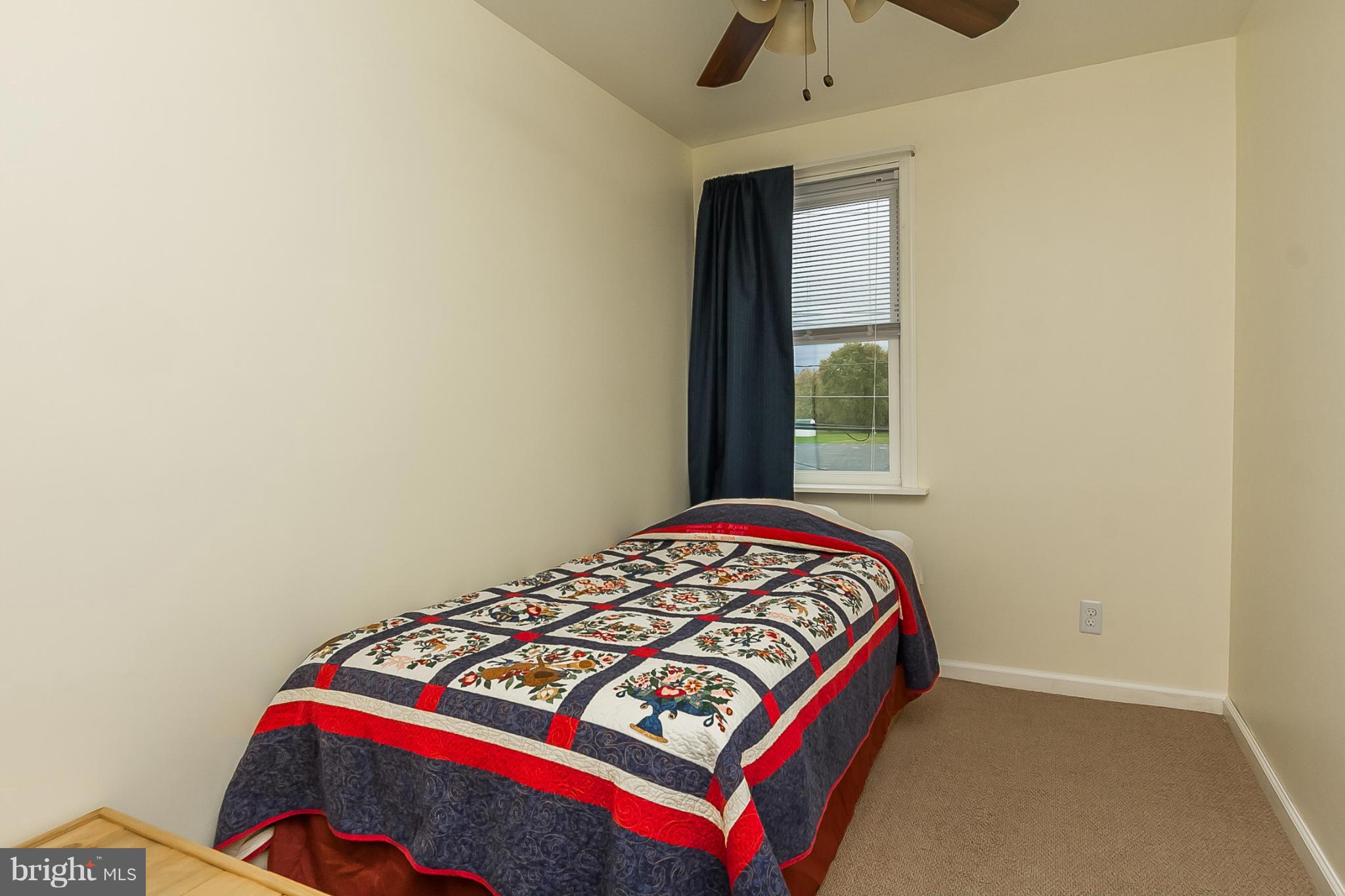 716 Aldworth Road Baltimore, MD 21222 - Photo 18 of 29 a bedroom with a bed and a window