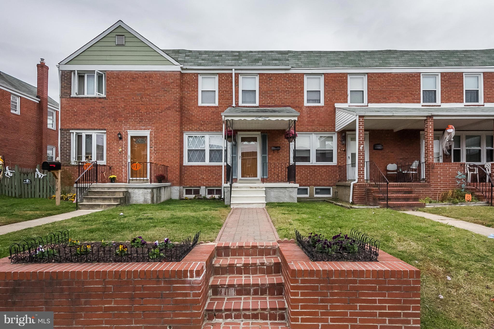 716 Aldworth Road Baltimore, MD 21222 - Photo 3 of 29 a front view of a house with a yard