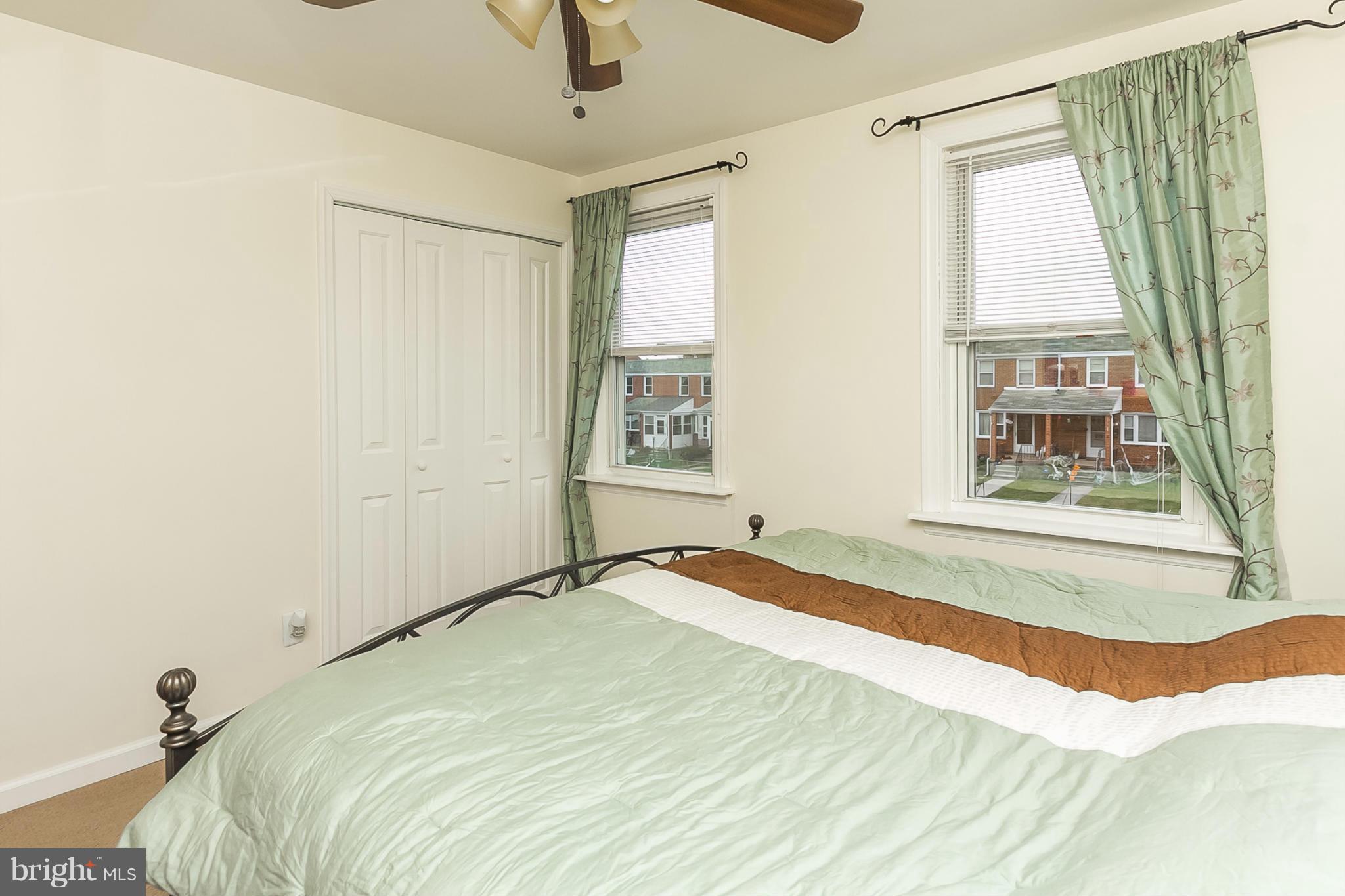 716 Aldworth Road Baltimore, MD 21222 - Photo 27 of 29 a bedroom with a bed and a window