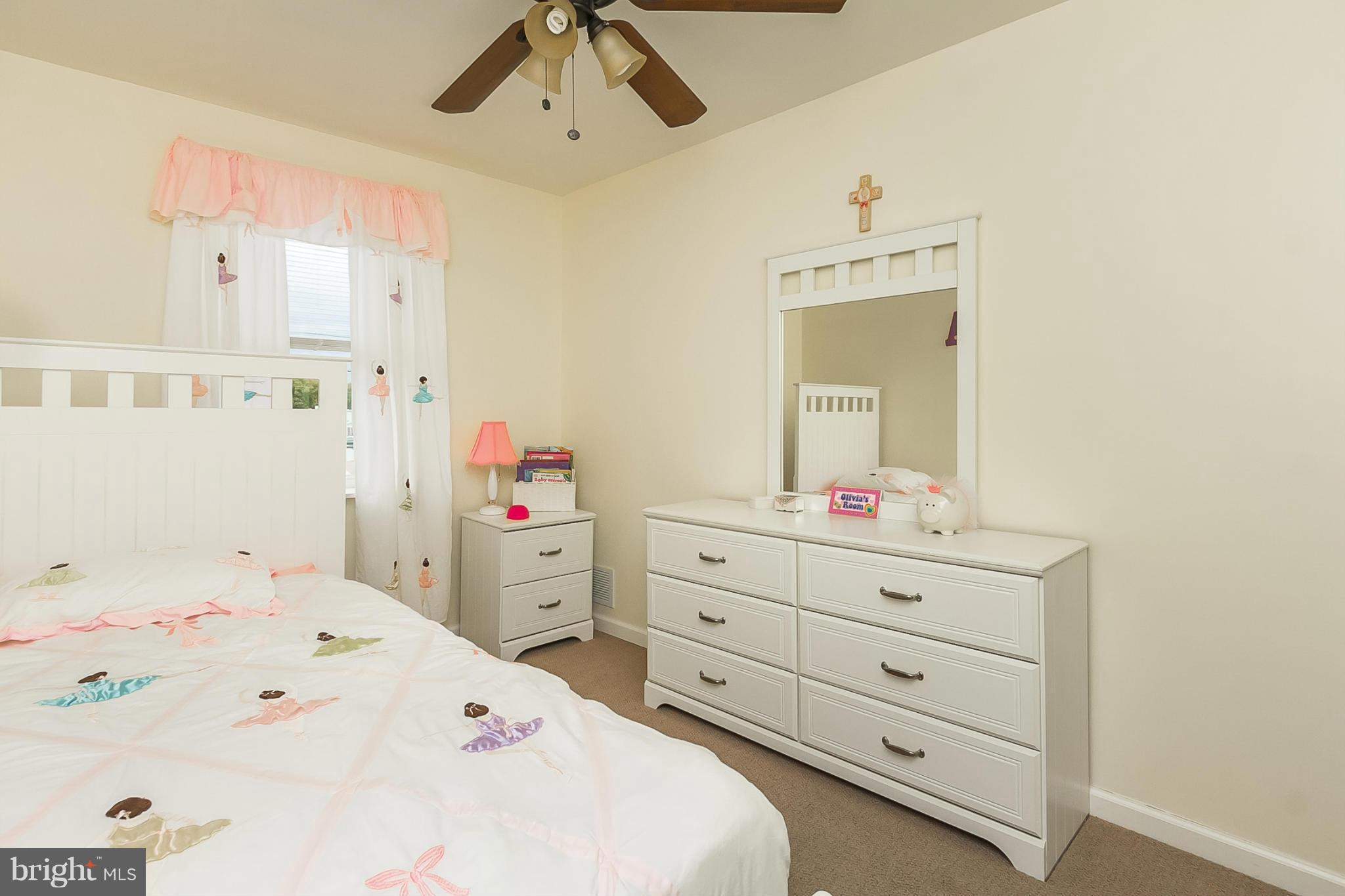 716 Aldworth Road Baltimore, MD 21222 - Photo 28 of 29 a bedroom with a bed and a dresser