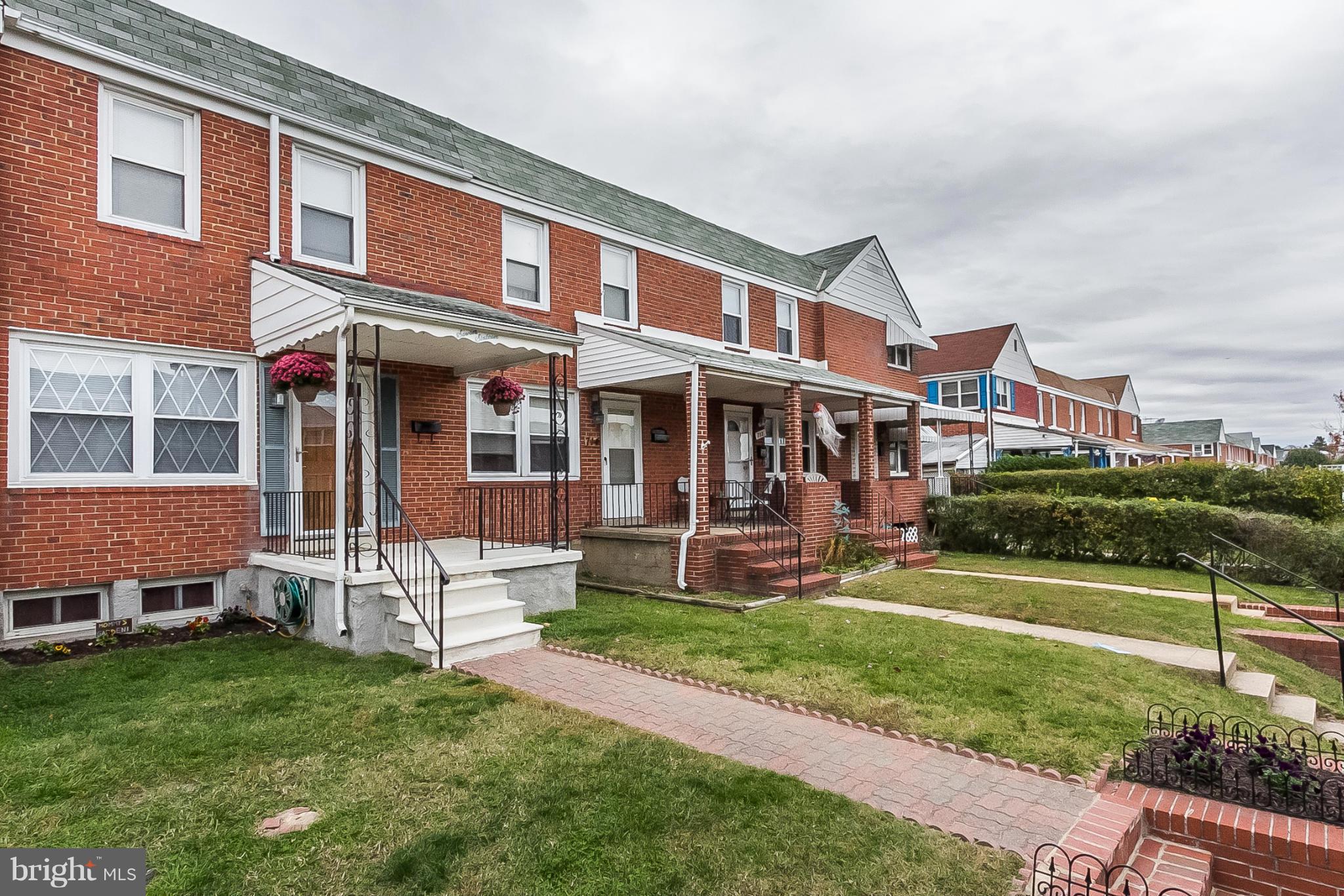 716 Aldworth Road Baltimore, MD 21222 - Photo 29 of 29 a front view of a house with a yard