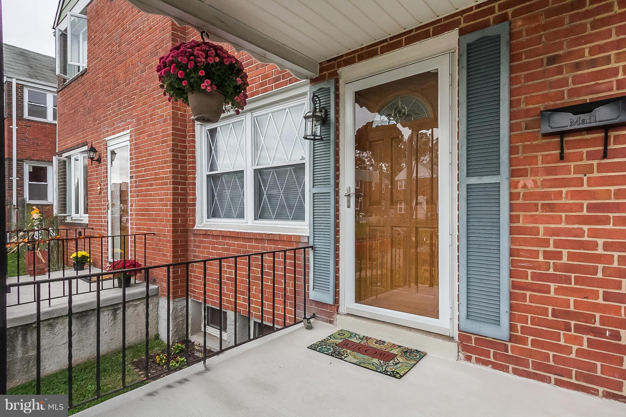 716 Aldworth Road Baltimore, MD 21222 - Photo 5 of 29 a front view of a house with a garage