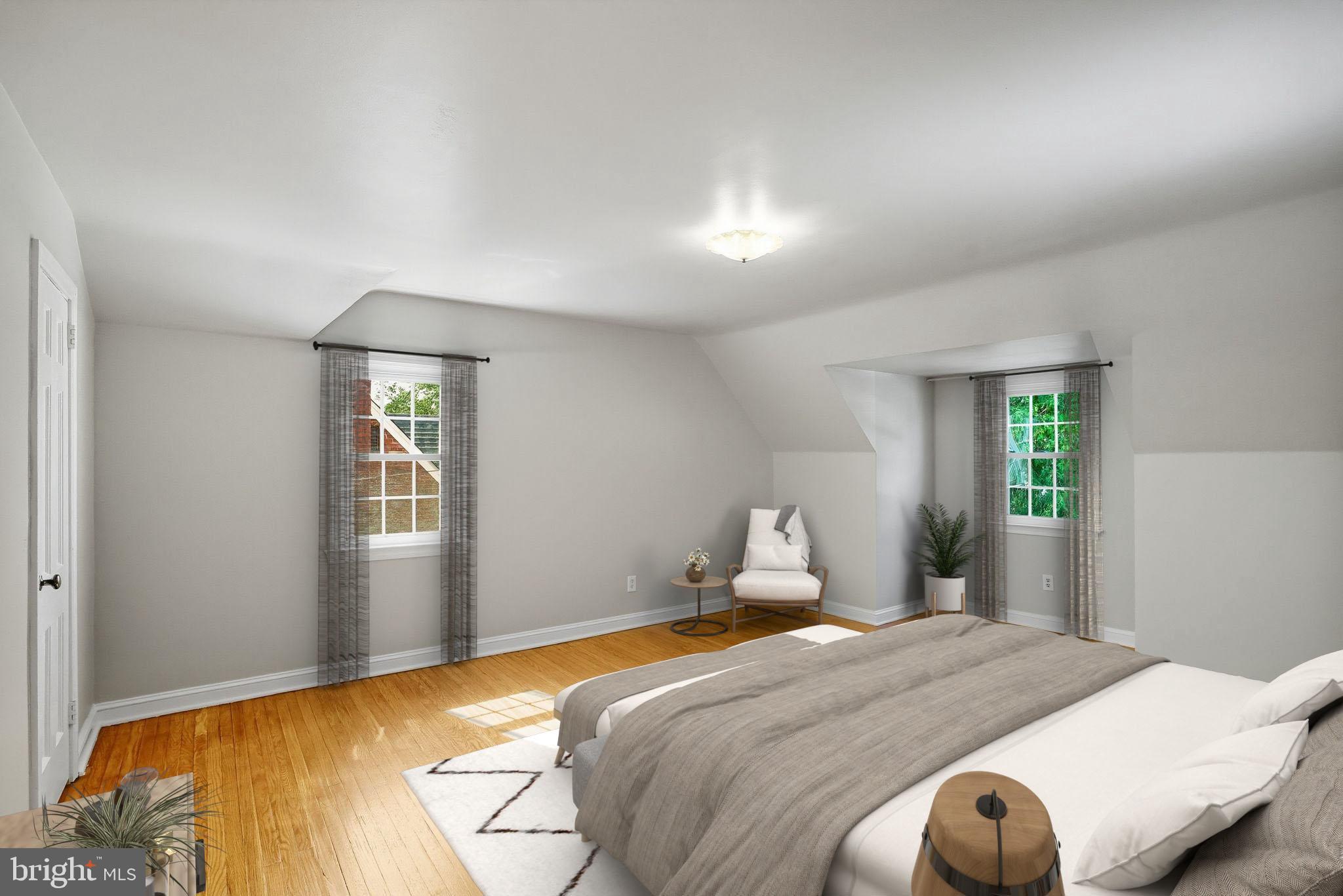 979 Edgewood Drive Springfield, PA 19064 - Photo 16 of 36 a bedroom with a bed and window