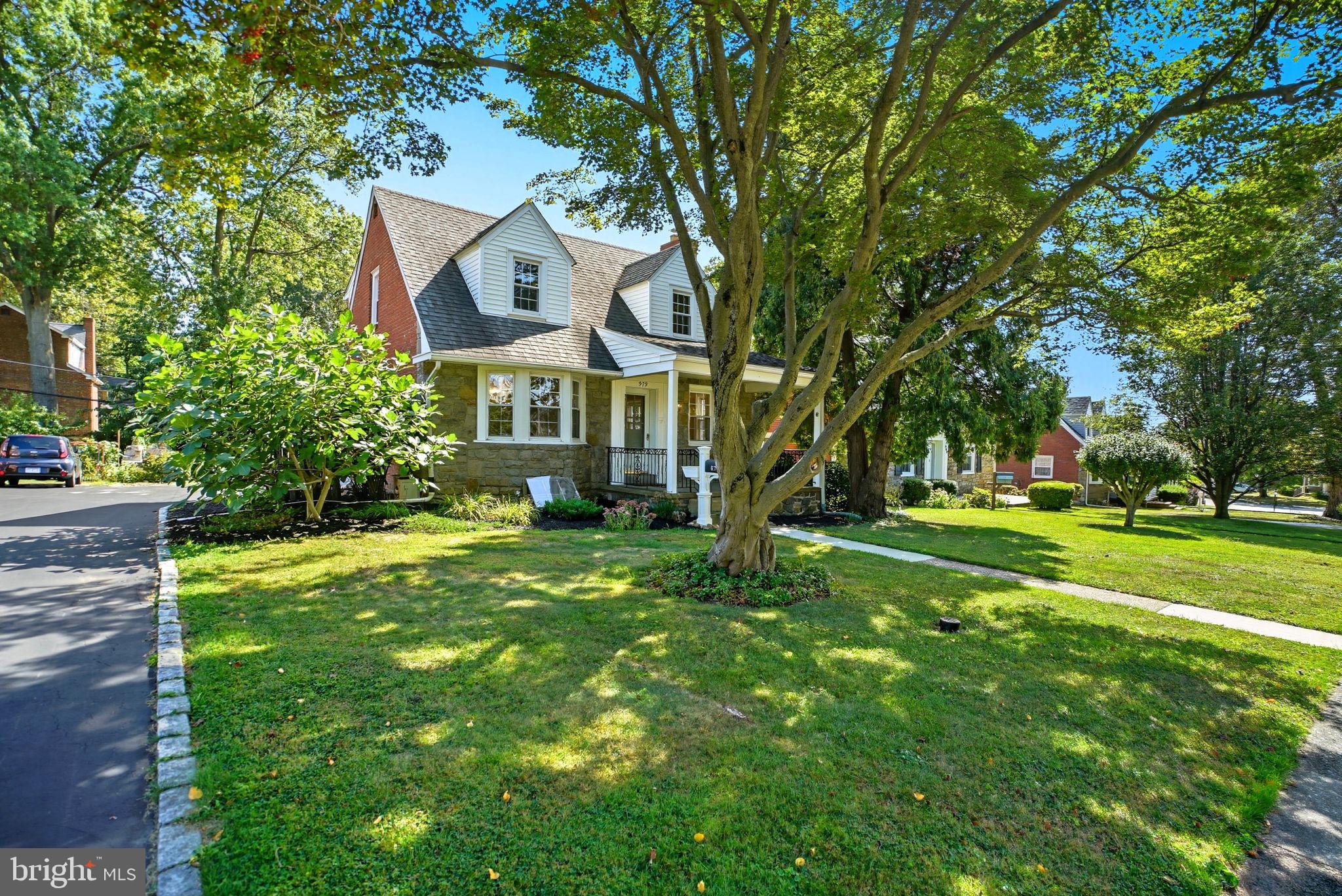 979 Edgewood Drive Springfield, PA 19064 - Photo 2 of 36 a front view of house with yard and green space