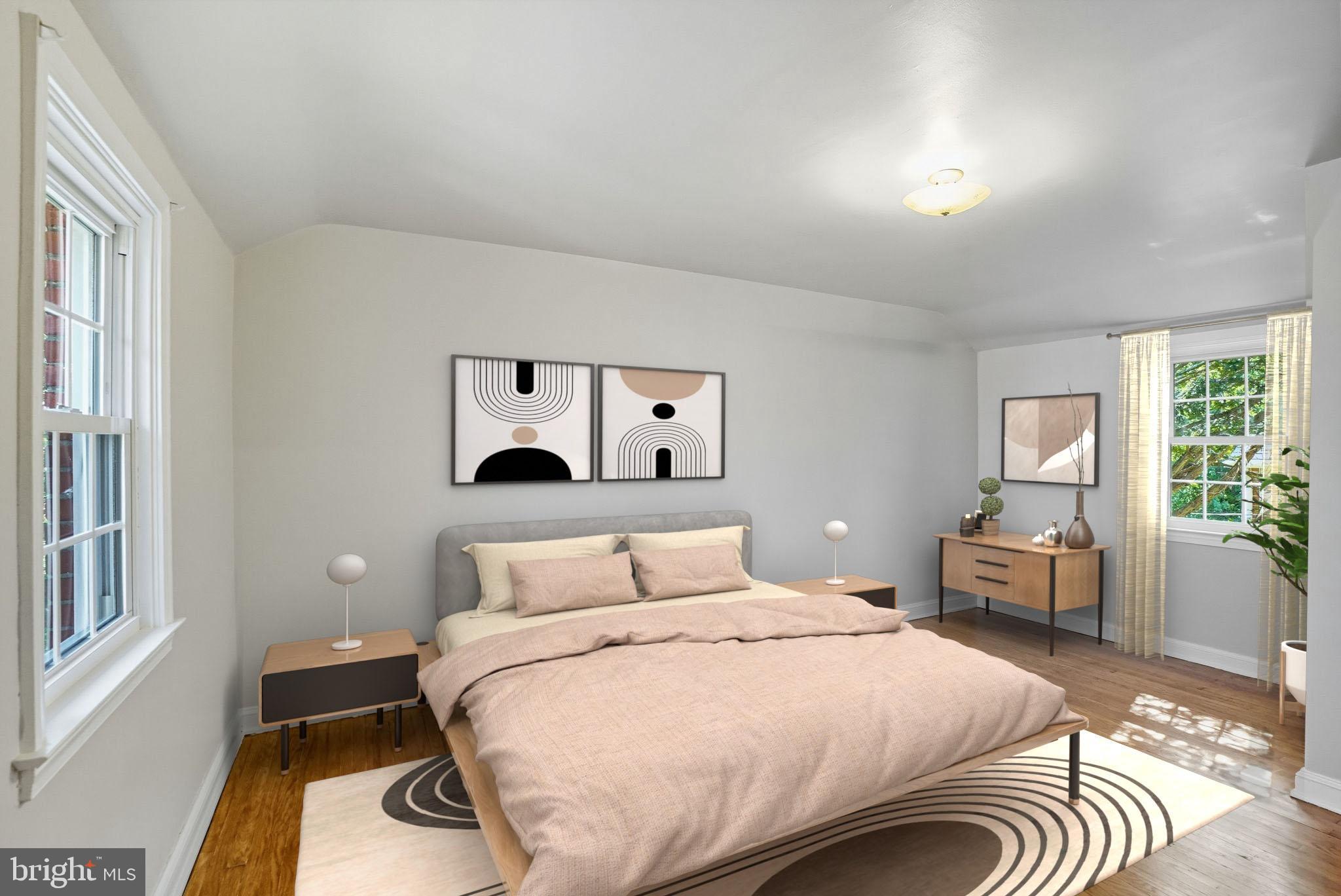 979 Edgewood Drive Springfield, PA 19064 - Photo 21 of 36 a bedroom with a large bed and a window