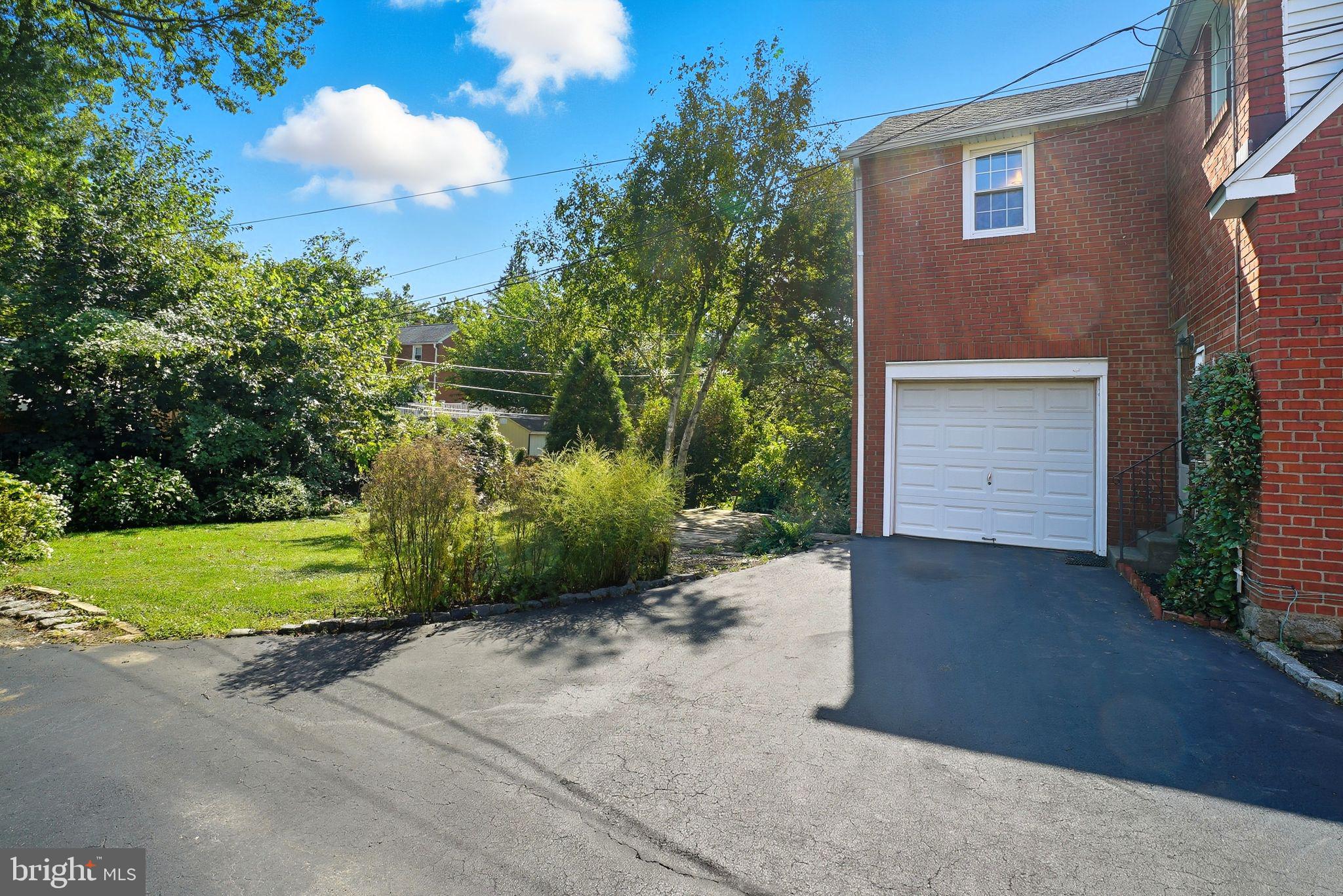 979 Edgewood Drive Springfield, PA 19064 - Photo 29 of 36 a view of backyard of house and trees