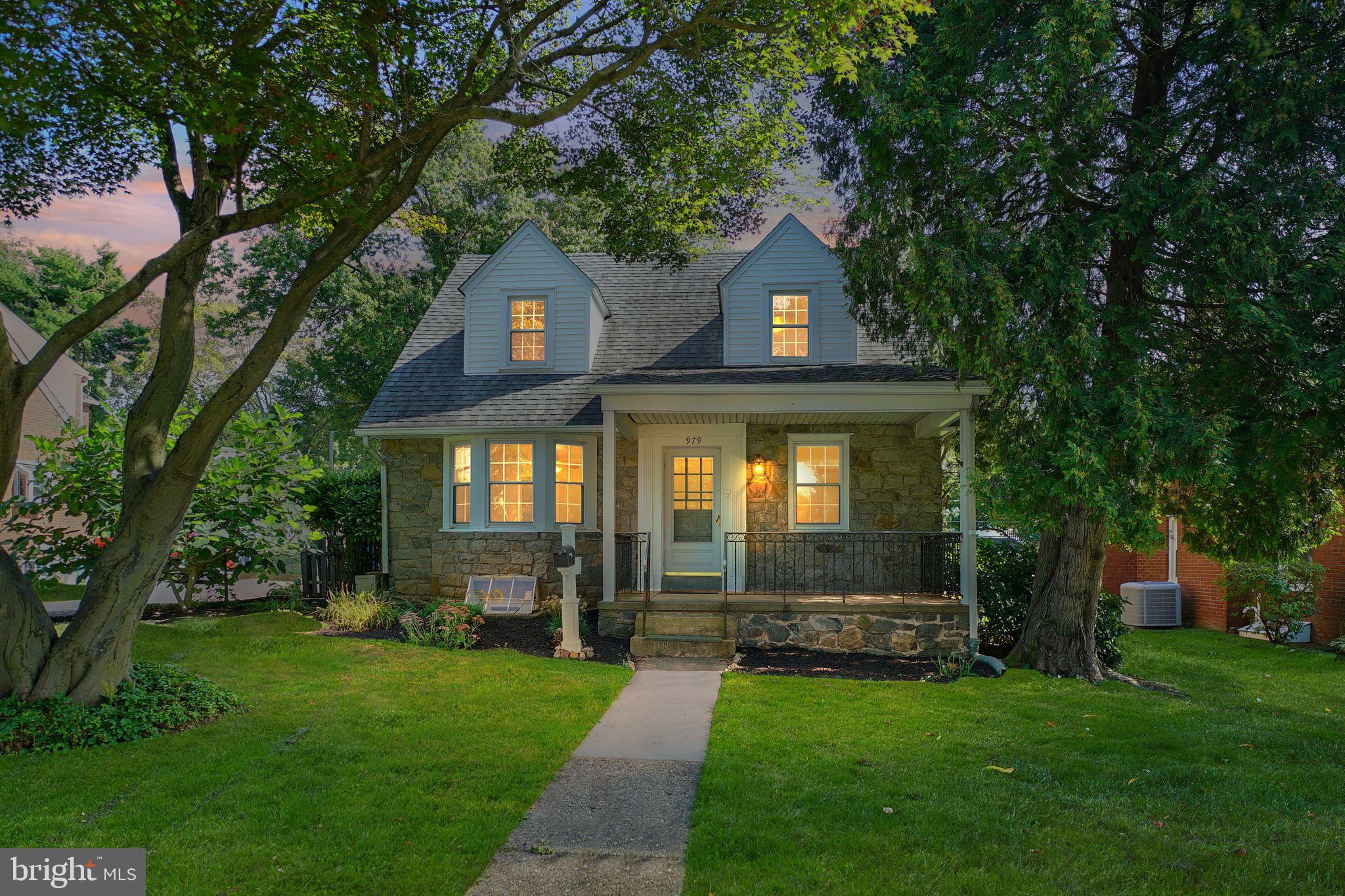 979 Edgewood Drive Springfield, PA 19064 - Photo 33 of 36 a front view of a house with a yard