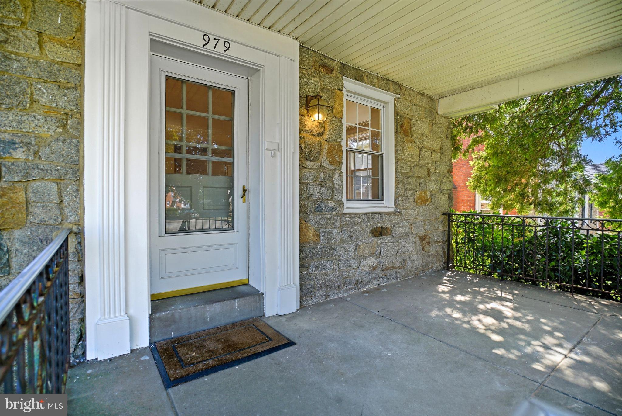 979 Edgewood Drive Springfield, PA 19064 - Photo 4 of 36 a view of backyard with window and entryway