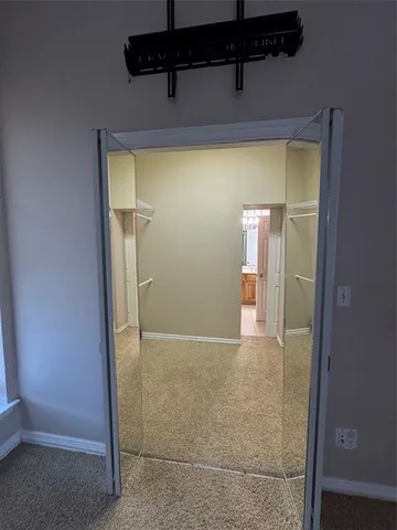 a view of a hallway with a elevator