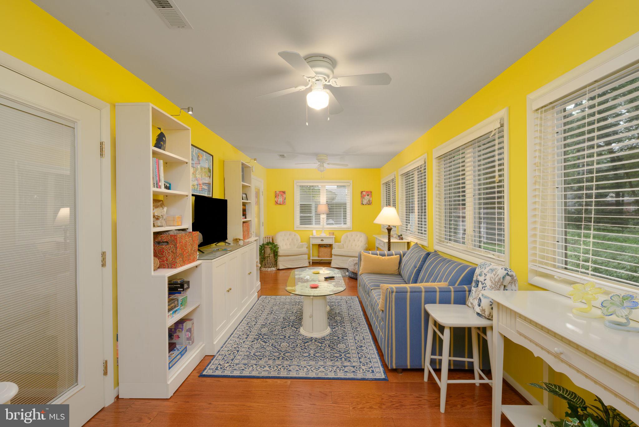 10 Gloucester Road Ocean Pines, MD 21811 - Photo 16 of 37 a living room with furniture and a flat screen tv