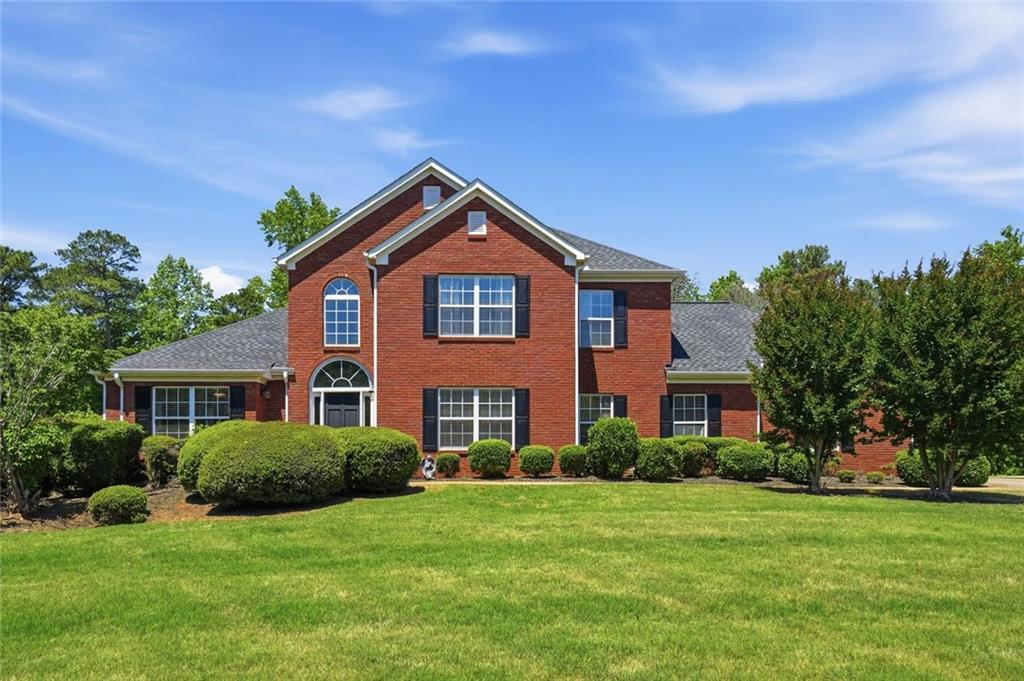 3675 Falls Trail Winston, GA 30187 - Photo 1 of 47 a front view of a house with a yard