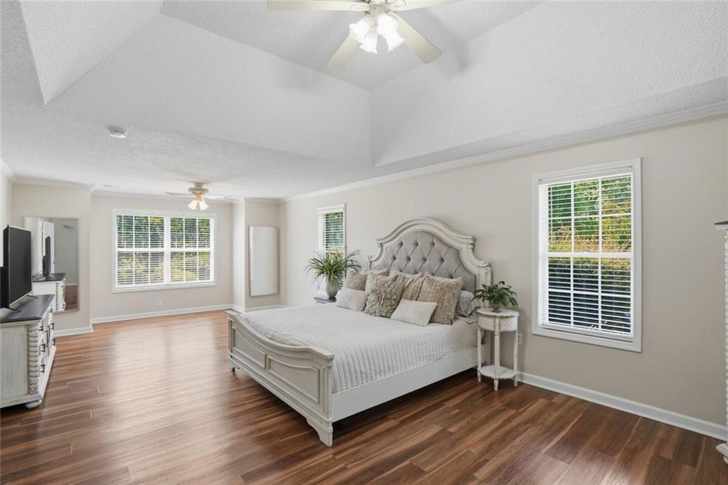 3675 Falls Trail Winston, GA 30187 - Photo 18 of 47 a living room with a bed furniture and a window