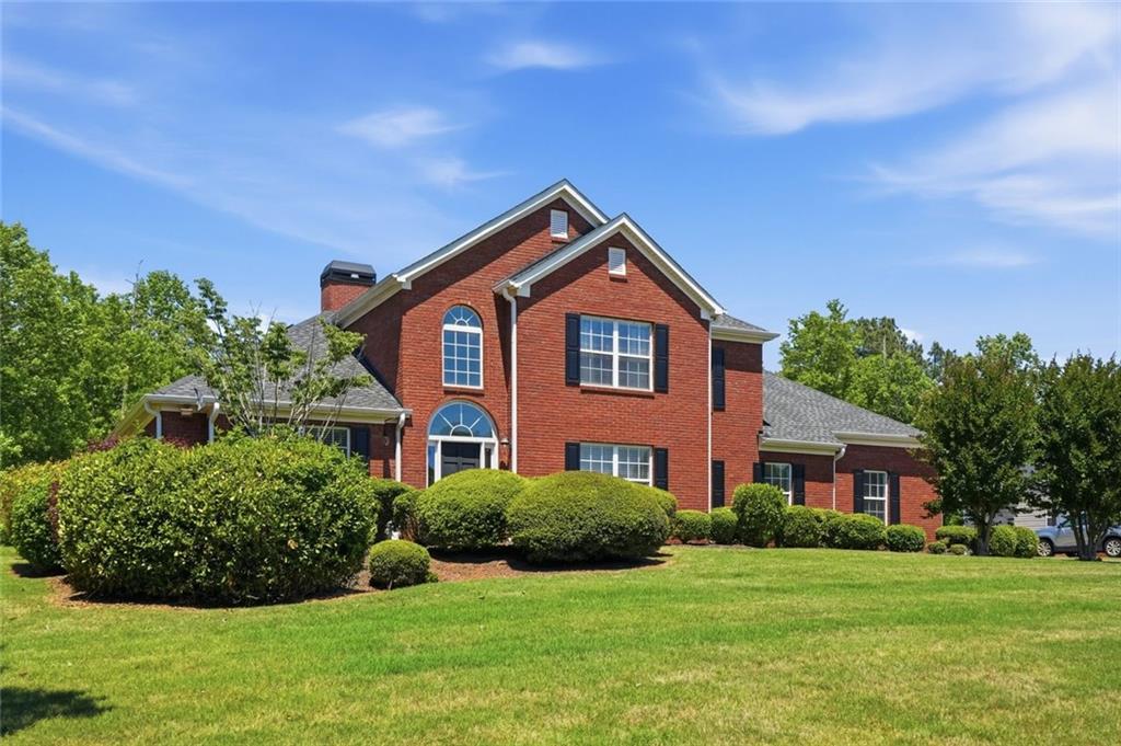 3675 Falls Trail Winston, GA 30187 - Photo 2 of 47 a front view of a house with a yard