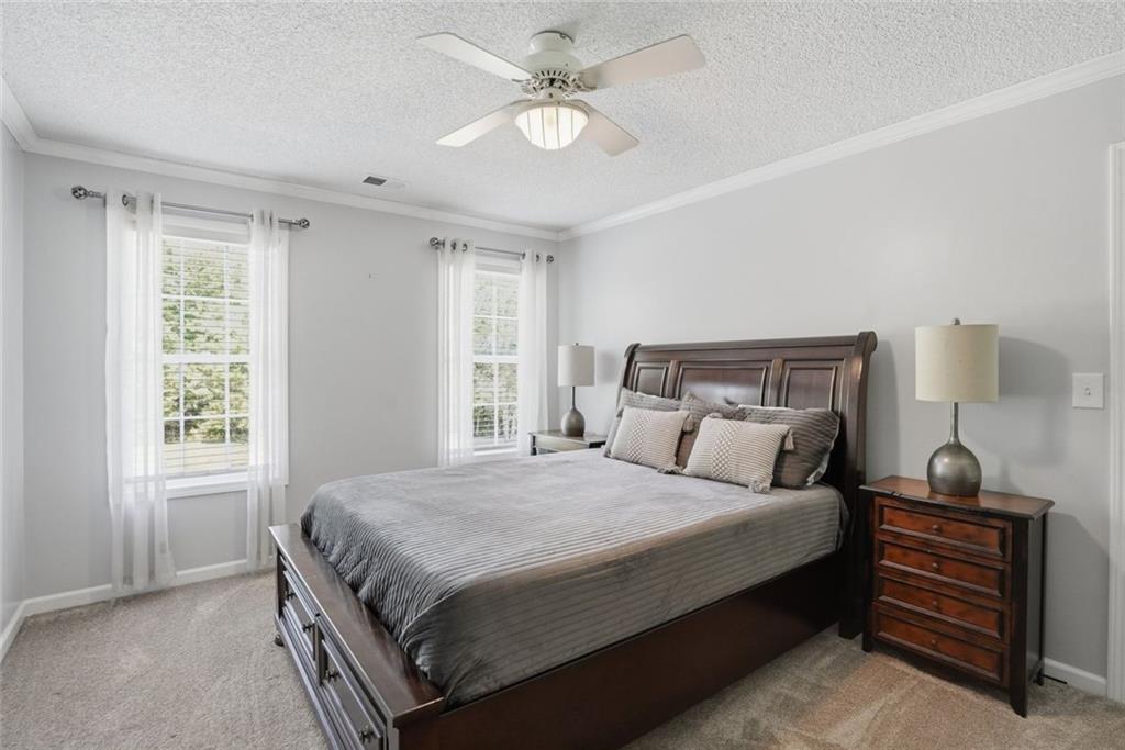 3675 Falls Trail Winston, GA 30187 - Photo 28 of 47 a bedroom with a bed and a window