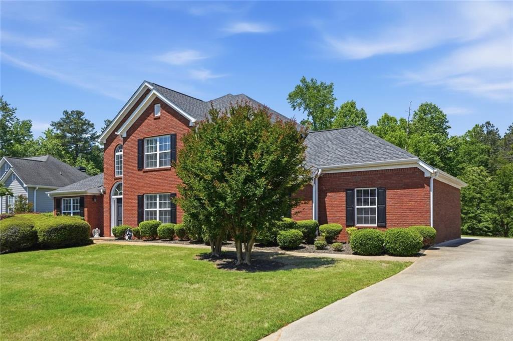 3675 Falls Trail Winston, GA 30187 - Photo 3 of 47 a front view of a house with a yard
