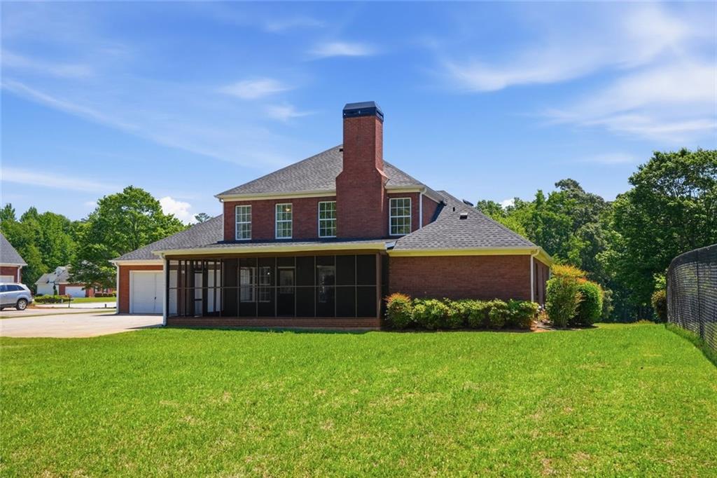 3675 Falls Trail Winston, GA 30187 - Photo 38 of 47 a front view of a house with a garden