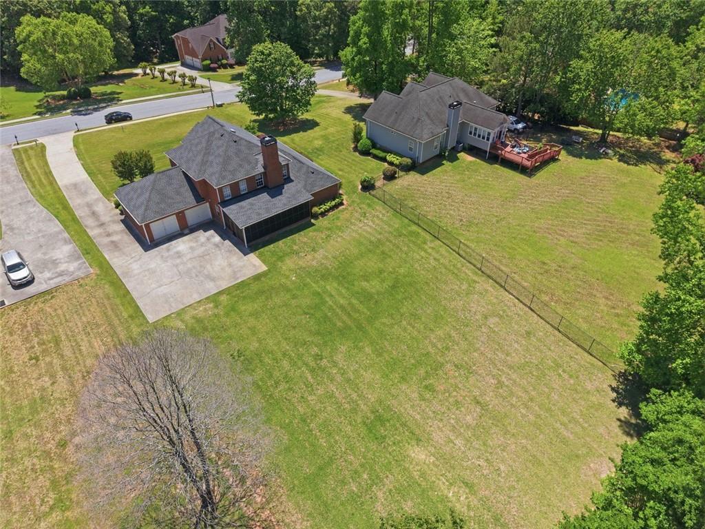 3675 Falls Trail Winston, GA 30187 - Photo 44 of 47 a view of a swimming pool with a yard