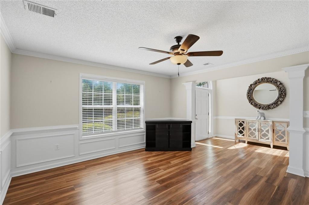 3675 Falls Trail Winston, GA 30187 - Photo 7 of 47 a view of a livingroom with furniture wooden floor and a window