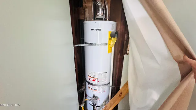 a view of a house with snow on the wall