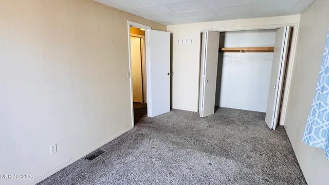 a kitchen with stainless steel appliances a stove a sink and a refrigerator