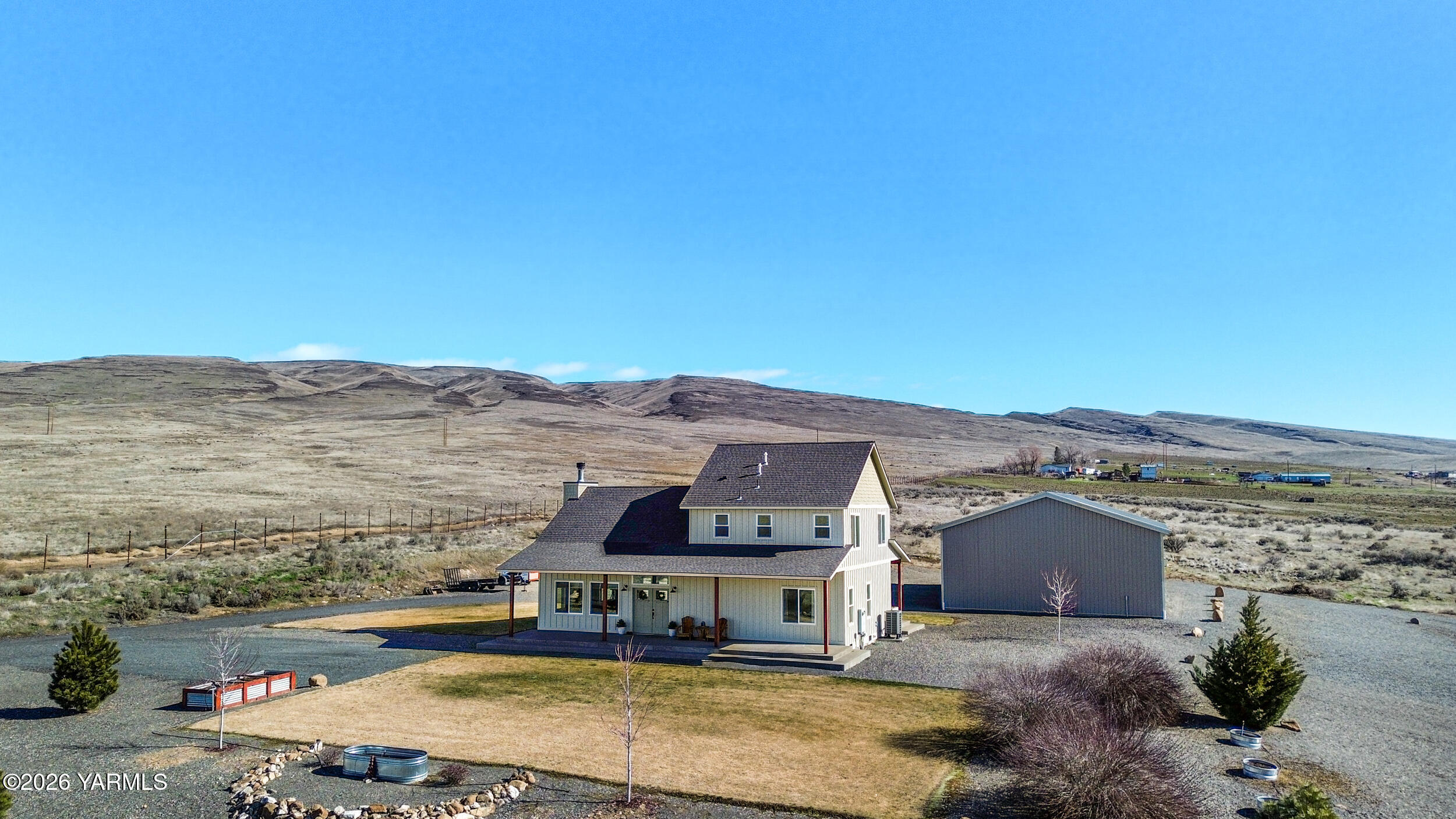 517 Game Ridge Road Selah, WA 98942 - Photo 3 of 72 an aerial view of residential houses with outdoor space