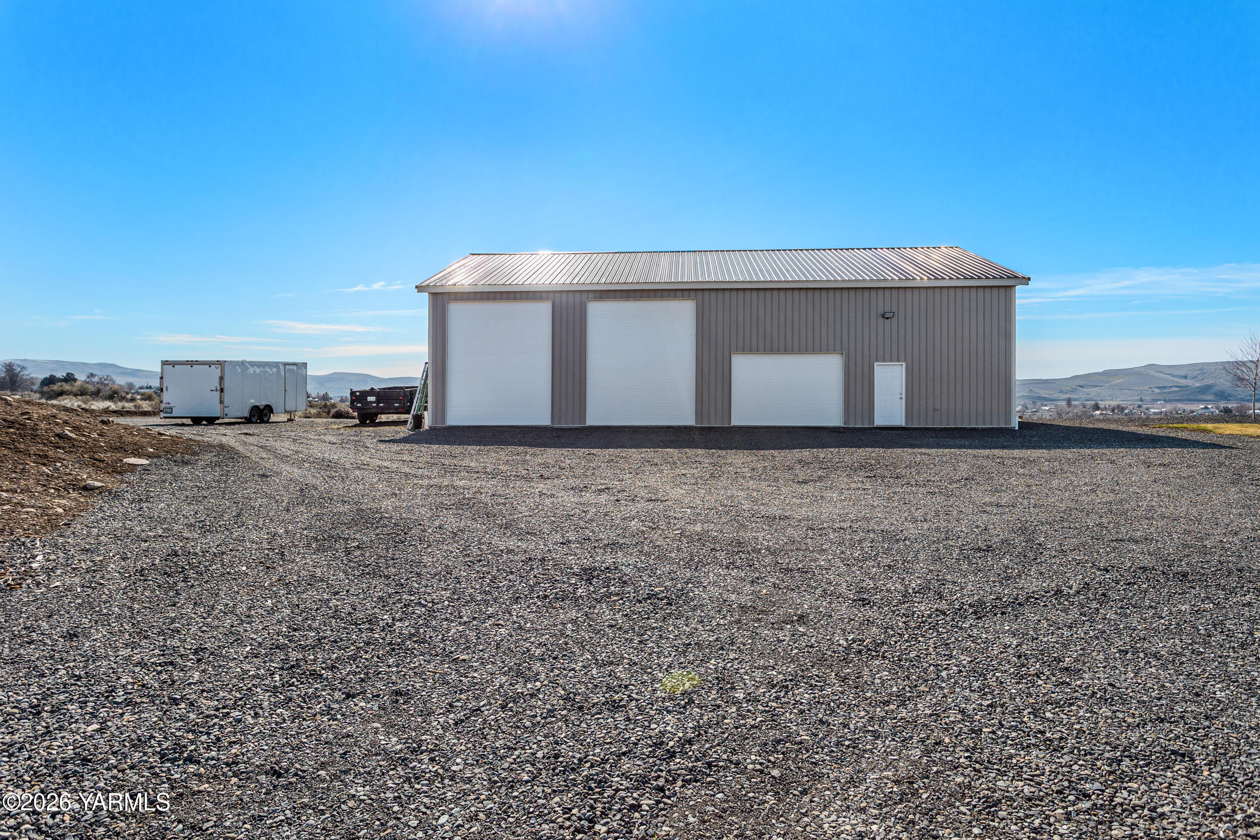 517 Game Ridge Road Selah, WA 98942 - Photo 41 of 72 a view of a dry yard with wooden fence