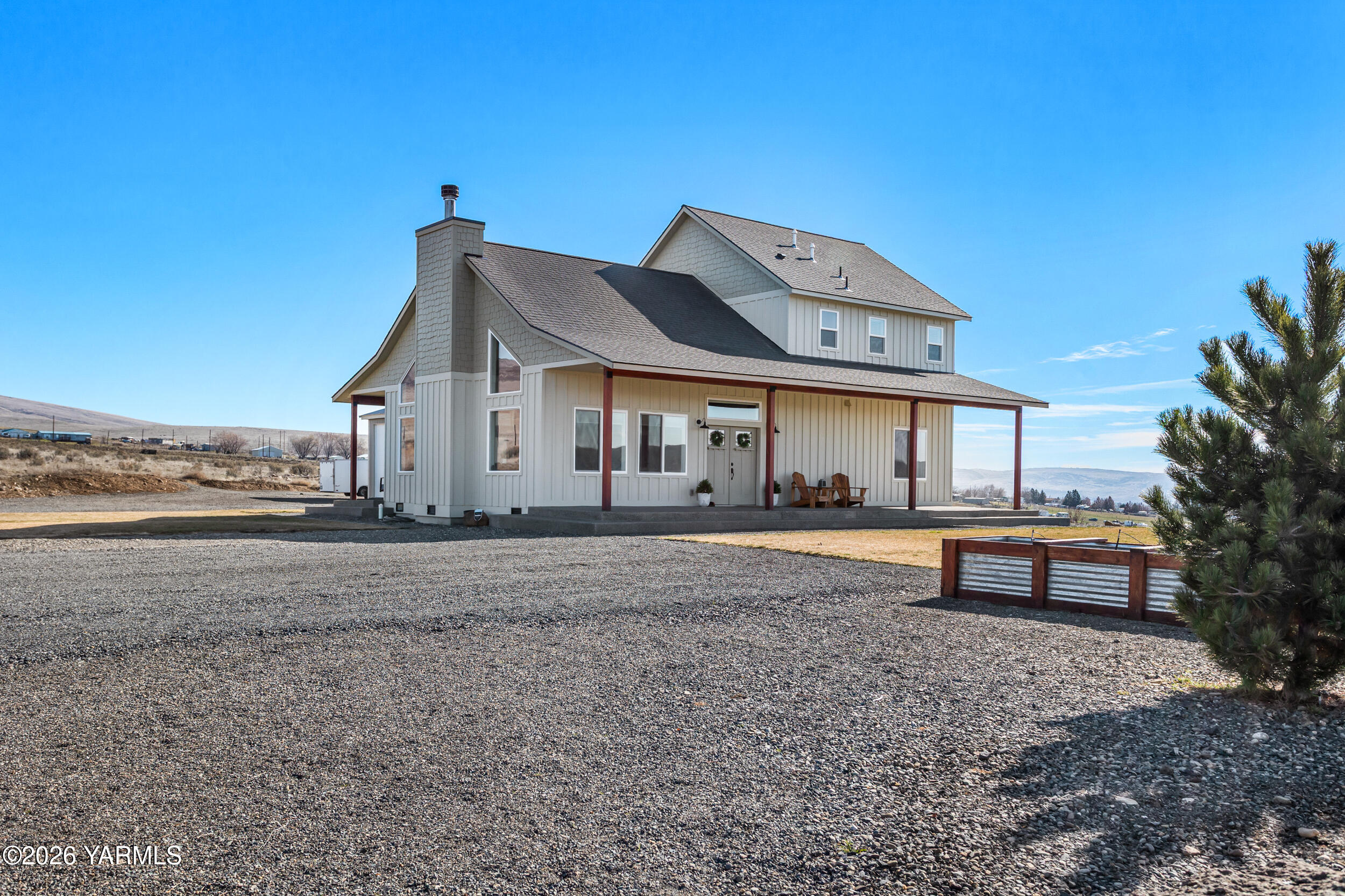 517 Game Ridge Road Selah, WA 98942 - Photo 69 of 72 a front view of a house with a garden