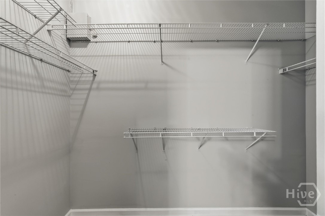 11 Wild Heron Villas Road Savannah, GA 31419 - Photo 26 of 45 Walk-in closet with built-in shelving.