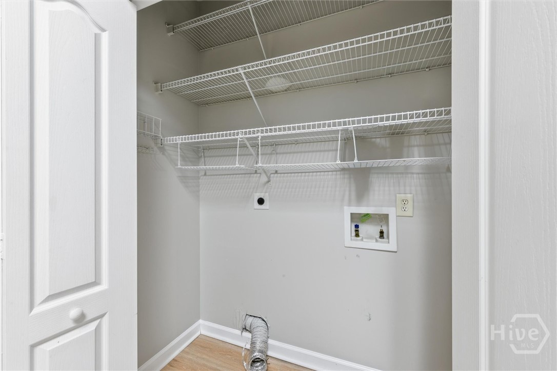 11 Wild Heron Villas Road Savannah, GA 31419 - Photo 30 of 45 Laundry area with built-in shelving.
