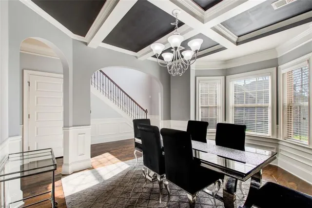 a view of a dining room with furniture