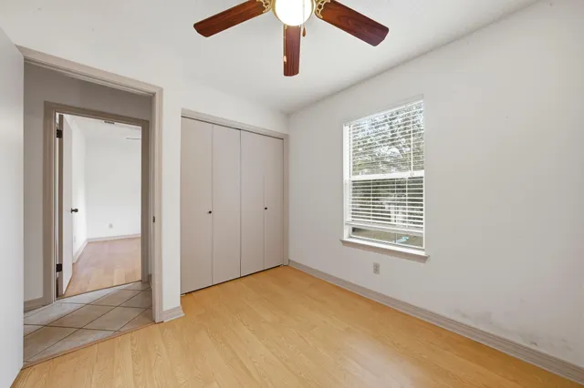 a bathroom with a sink a mirror and a toilet