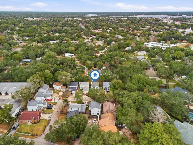 an aerial view of a city with lots of residential buildings