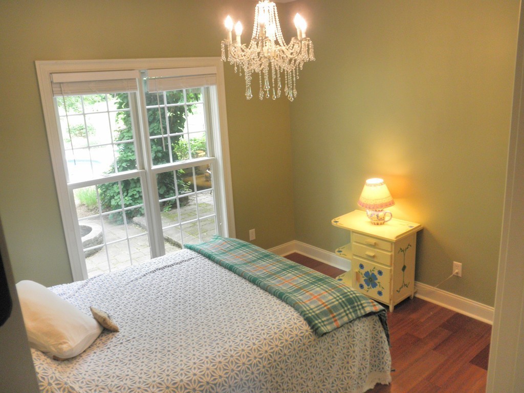 41 Montague Road Westhampton, MA 01027 - Photo 12 of 30 a bedroom with a bed and a window