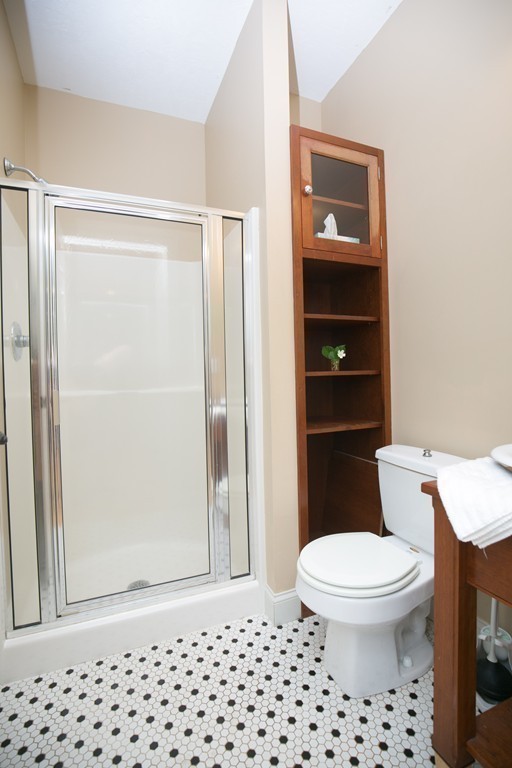 41 Montague Road Westhampton, MA 01027 - Photo 13 of 30 a white toilet sitting next to a shower curtain