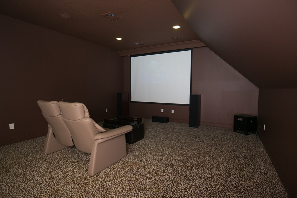 41 Montague Road Westhampton, MA 01027 - Photo 17 of 30 a projector room with table chairs and wooden floor