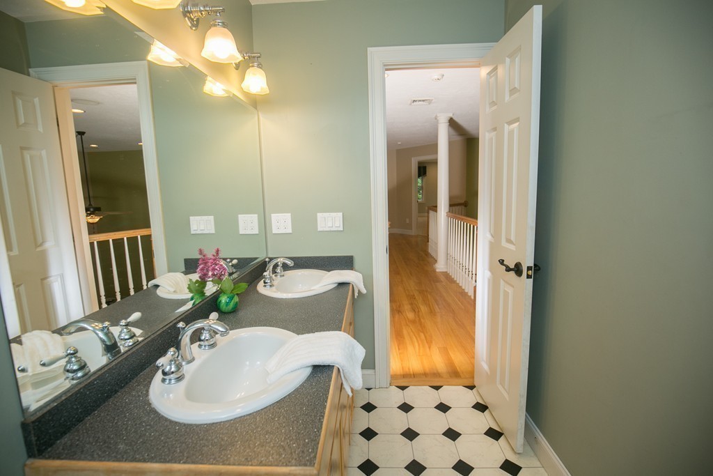 41 Montague Road Westhampton, MA 01027 - Photo 20 of 30 a bathroom with a sink vanity granite and a mirror