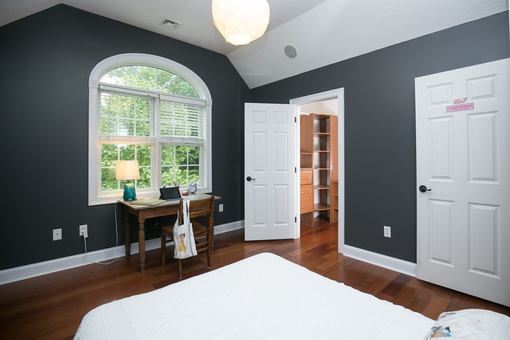 41 Montague Road Westhampton, MA 01027 - Photo 22 of 30 a bedroom with a large bed and a large window
