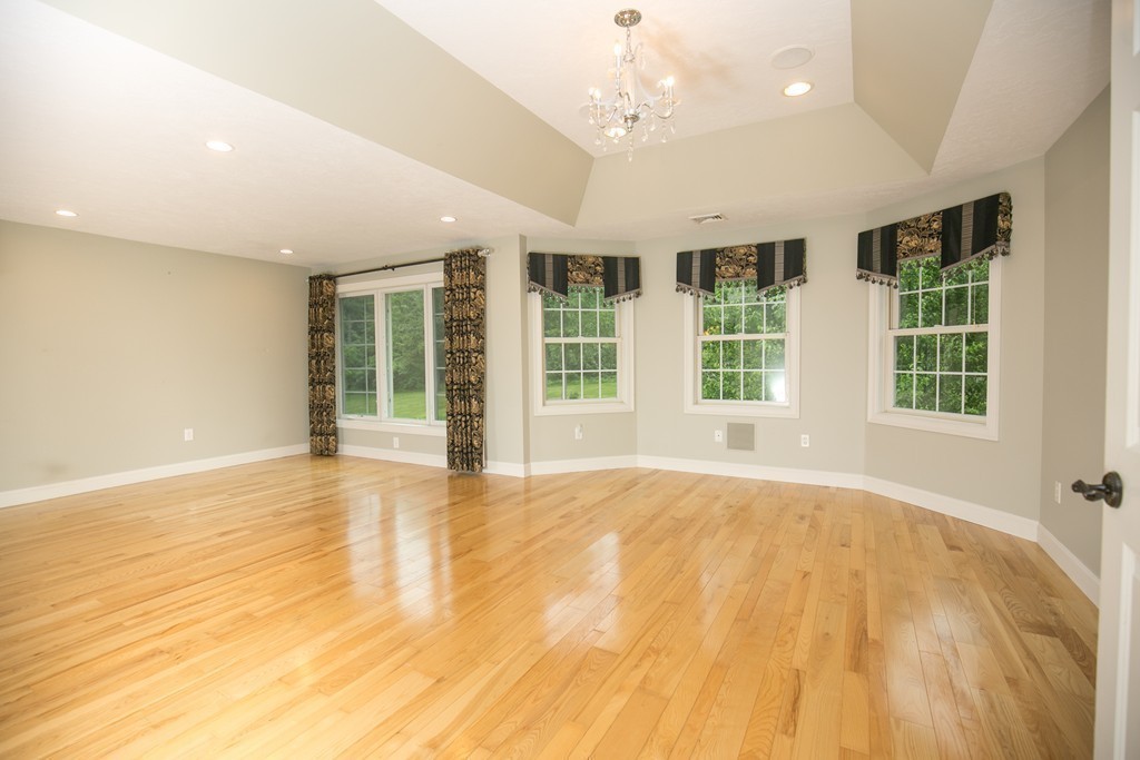 41 Montague Road Westhampton, MA 01027 - Photo 23 of 30 a view of an empty room with a window and wooden floor