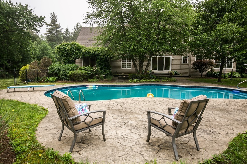 41 Montague Road Westhampton, MA 01027 - Photo 29 of 30 a lawn chair sitting in the middle of a house