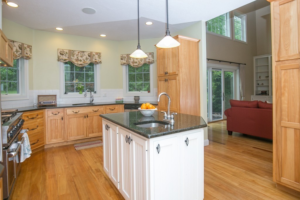41 Montague Road Westhampton, MA 01027 - Photo 5 of 30 a kitchen with granite countertop a sink appliances cabinets and furniture