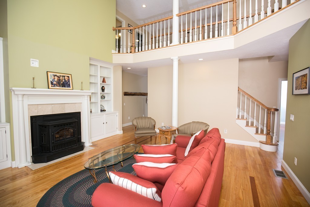 41 Montague Road Westhampton, MA 01027 - Photo 9 of 30 a living room with furniture fireplace and a flat screen tv