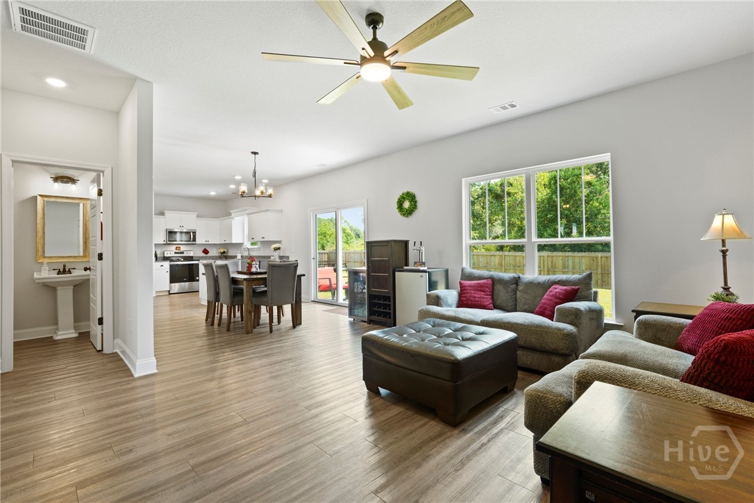 222 Hayden Place Rincon, GA 31326 - Photo 11 of 50 Family Room with View of Breakfast Area & Kitchen