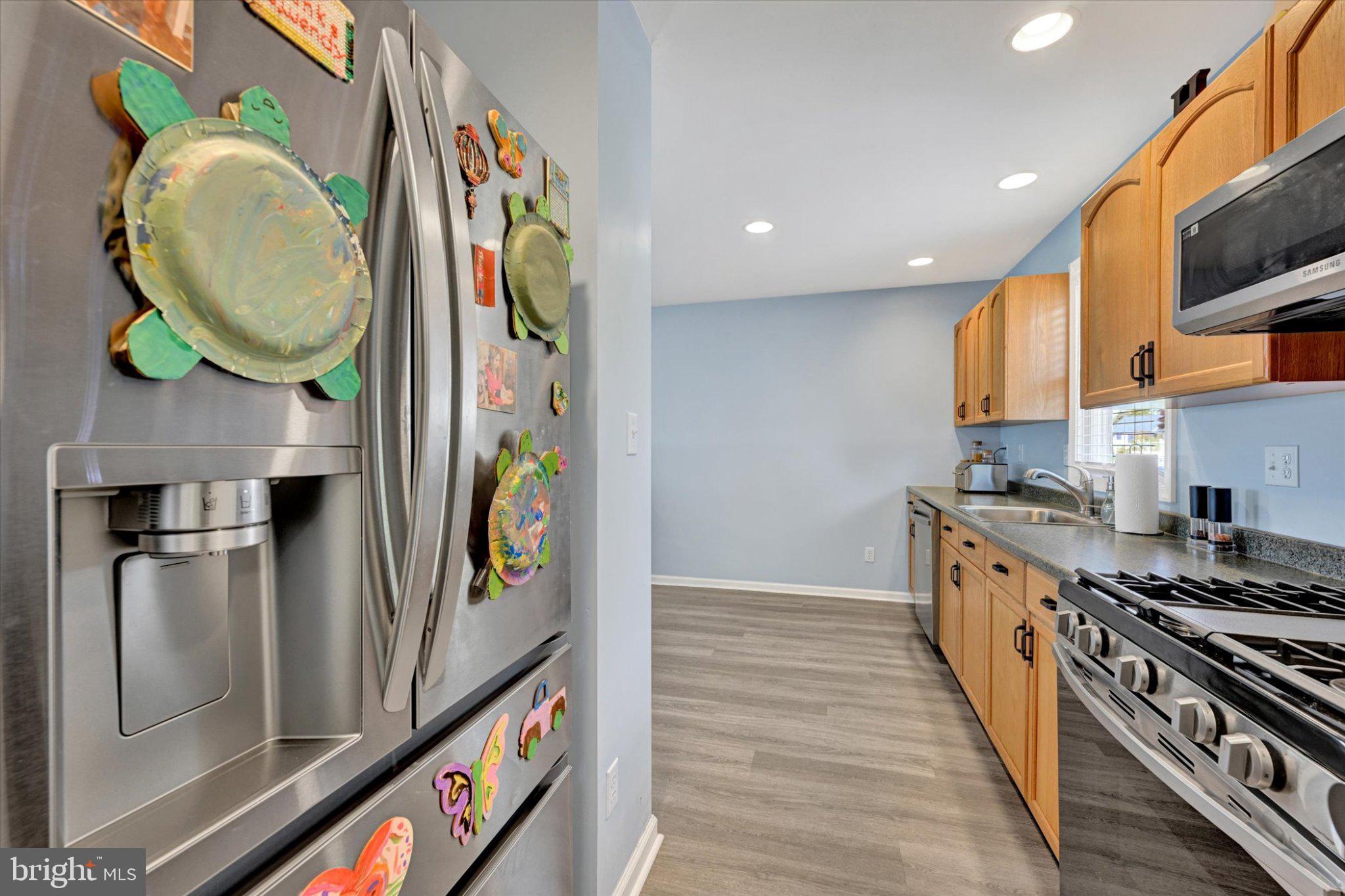 521 Riverside Drive Essex, MD 21221 - Photo 8 of 32 Modern kitchen with sleek appliances.