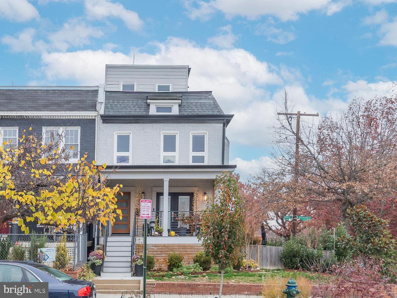 501 Longfellow Street Northwest, Unit B Washington, DC 20011 - Photo 1 of 22 a front view of a house with garden