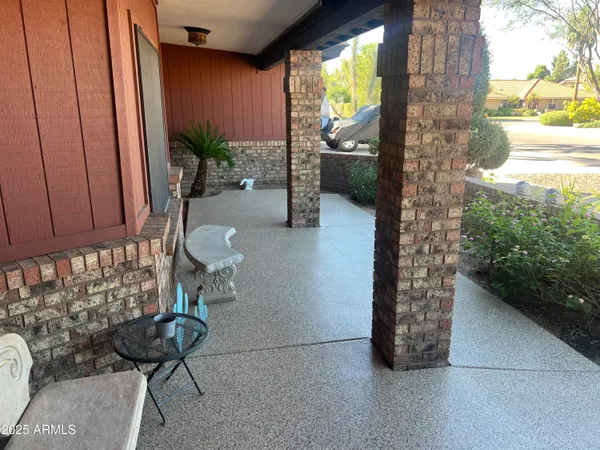 a house view with a garden space