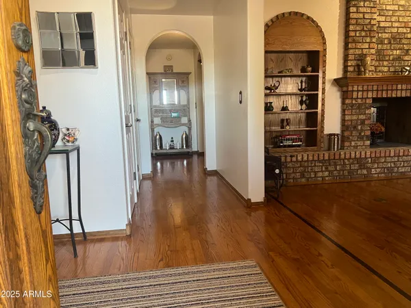 a view of livingroom with furniture and wooden floor