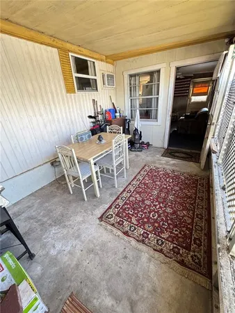 a living room with a couch and a flat screen tv